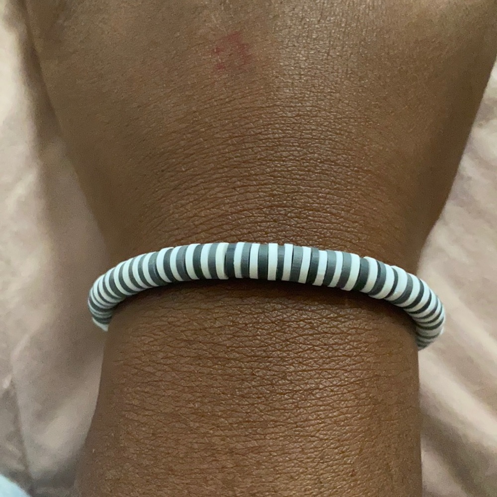dark gray and white bracelet